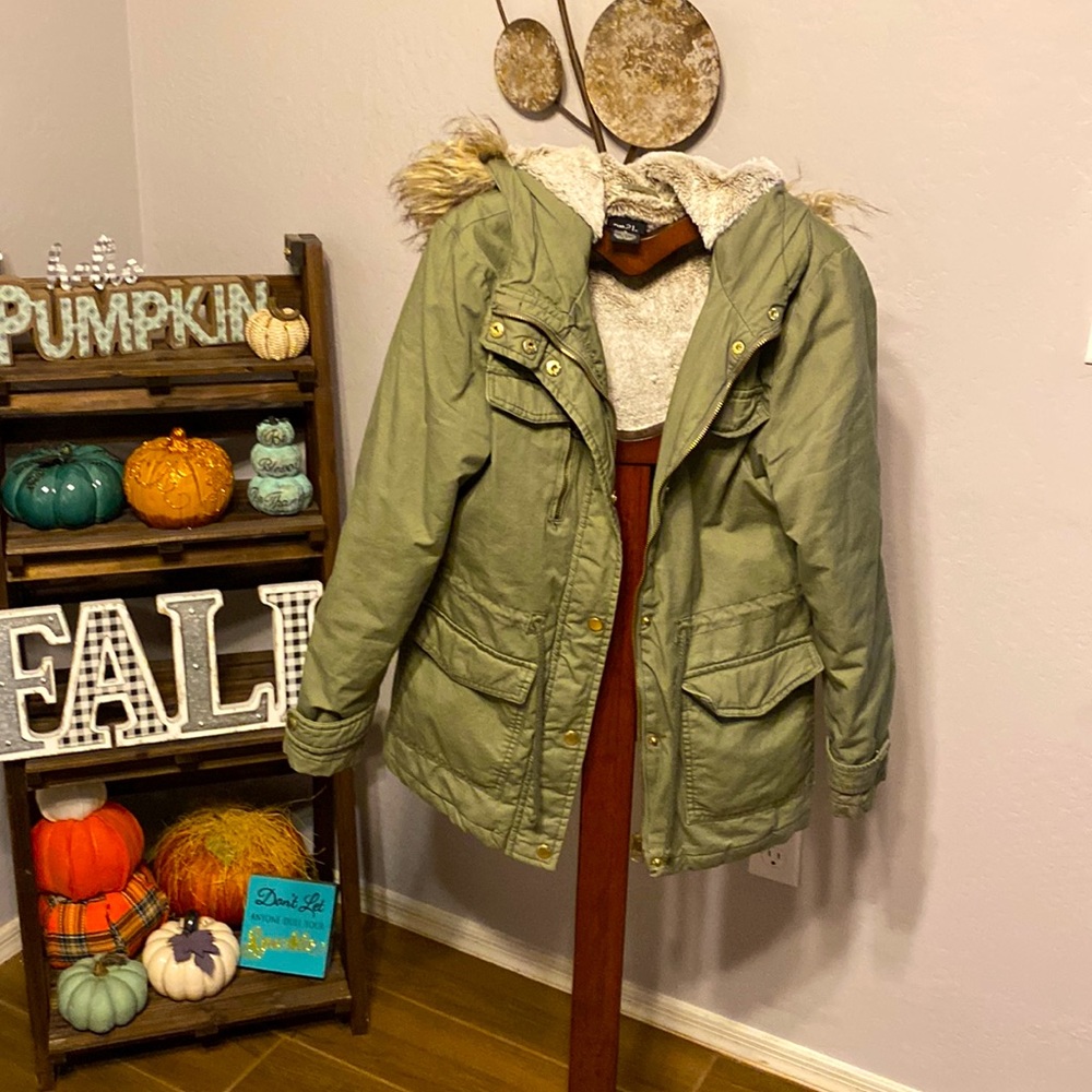 Green hooded jacket. Lightly lined.